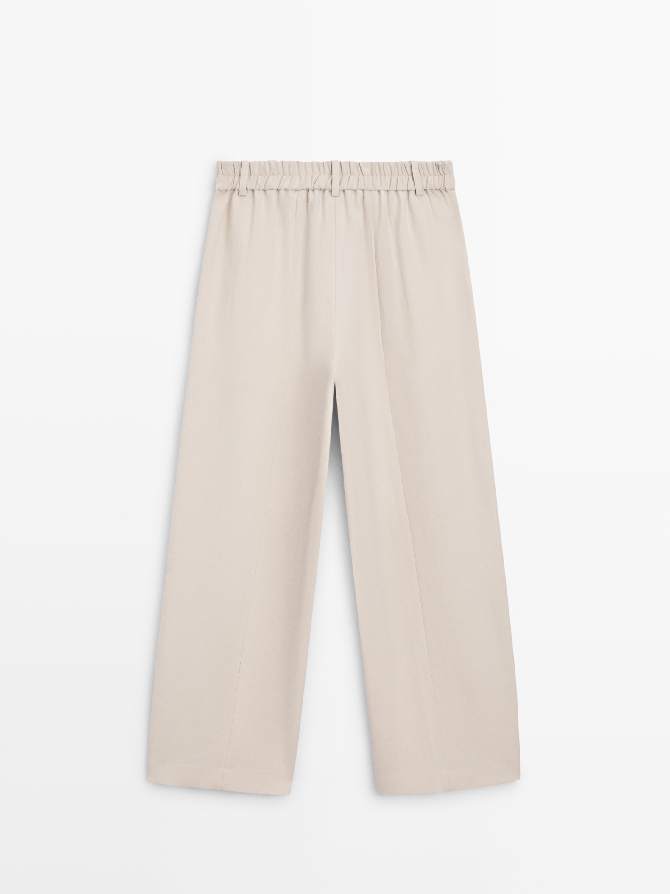 Flowing pants with elasticated waistband